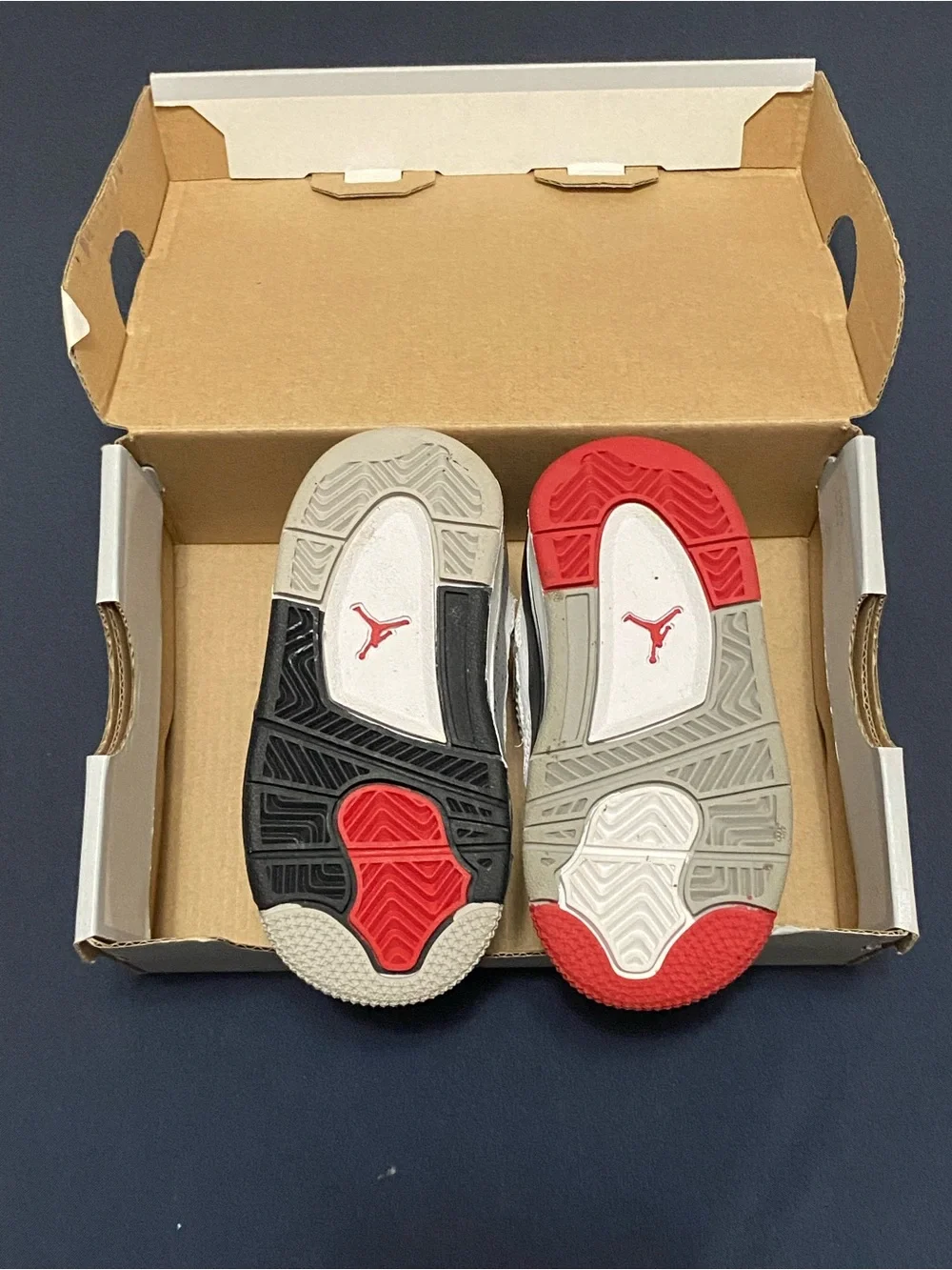 Nike Kids' White Sneakers with Red & Blue Accents